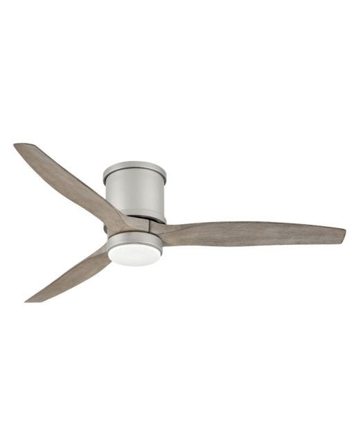 Three-blade ceiling fan with silver motor housing, light wood-toned blades, and a white light fixture.