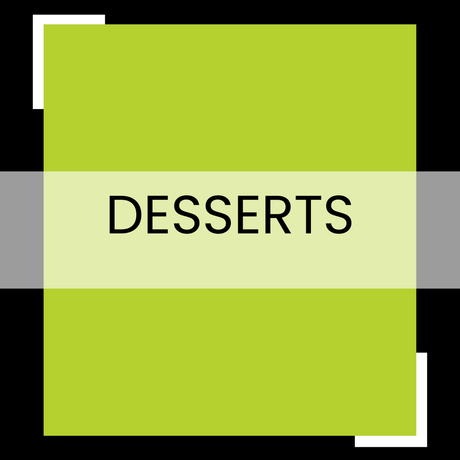Green square sign with the word “DESSERTS” in black on a pale yellow band, on a dark background