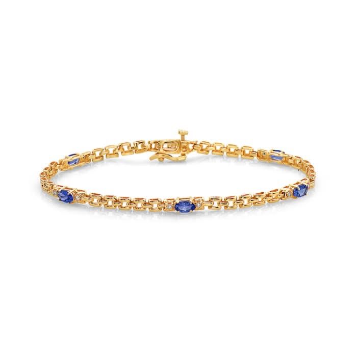 Gold bracelet with oval blue gemstones on a white background