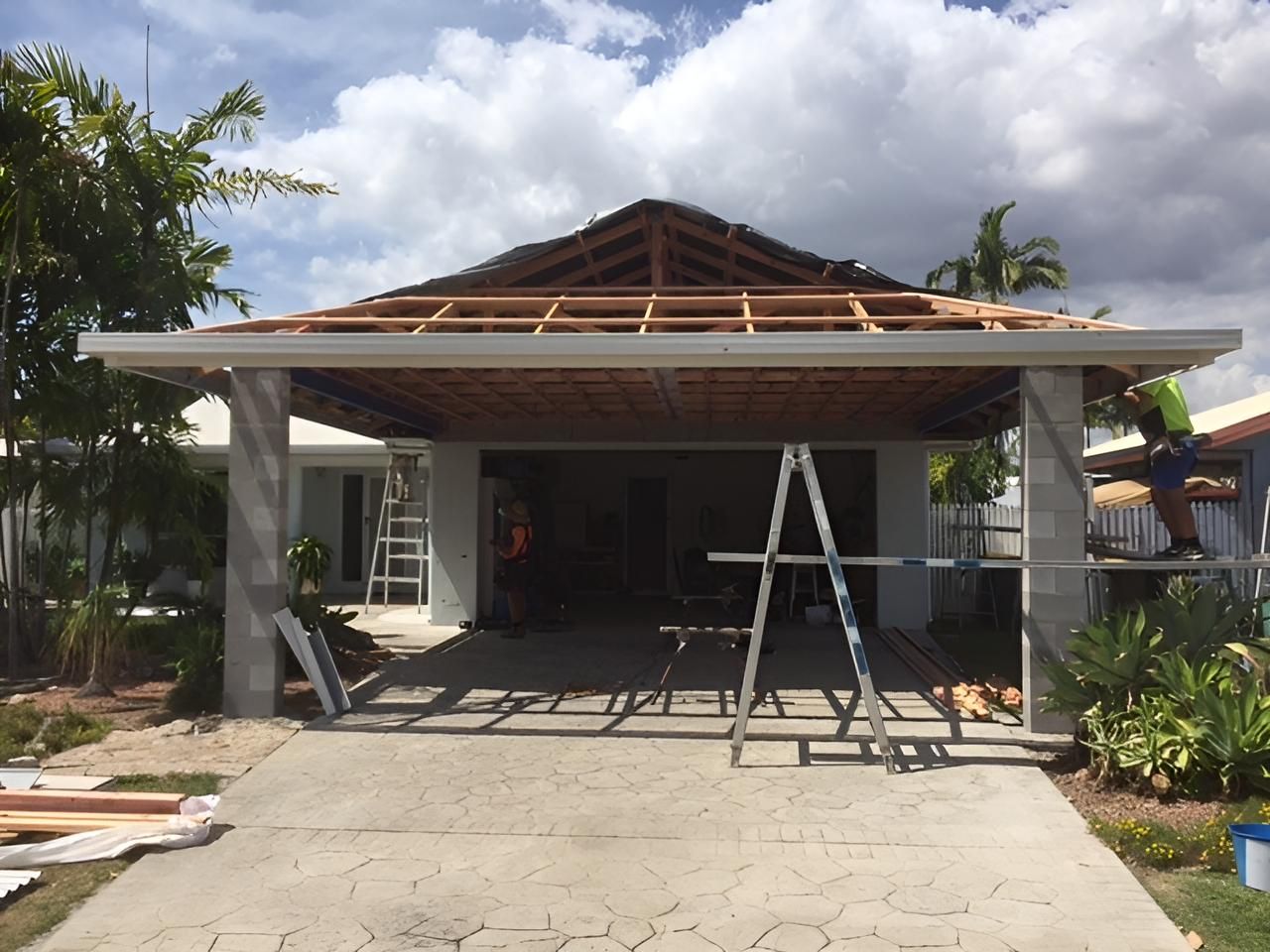 A House Under Construction With a Ladder in Front of It — Shane Firmin Carpentry Pty Ltd In Mount St John, QLD