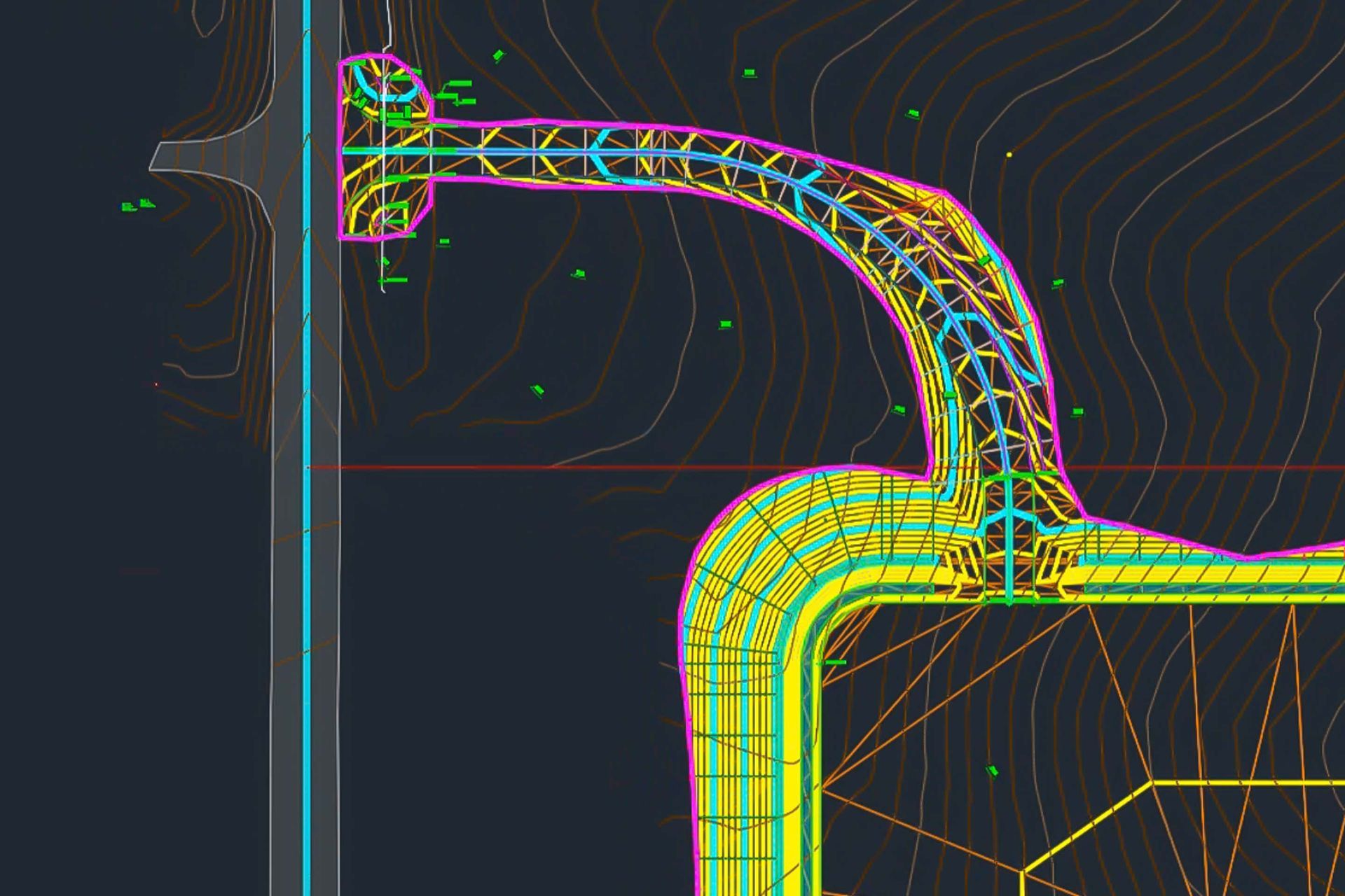 CAD drawing of a curving roadway with contour lines and color-coded features, likely an engineering plan.