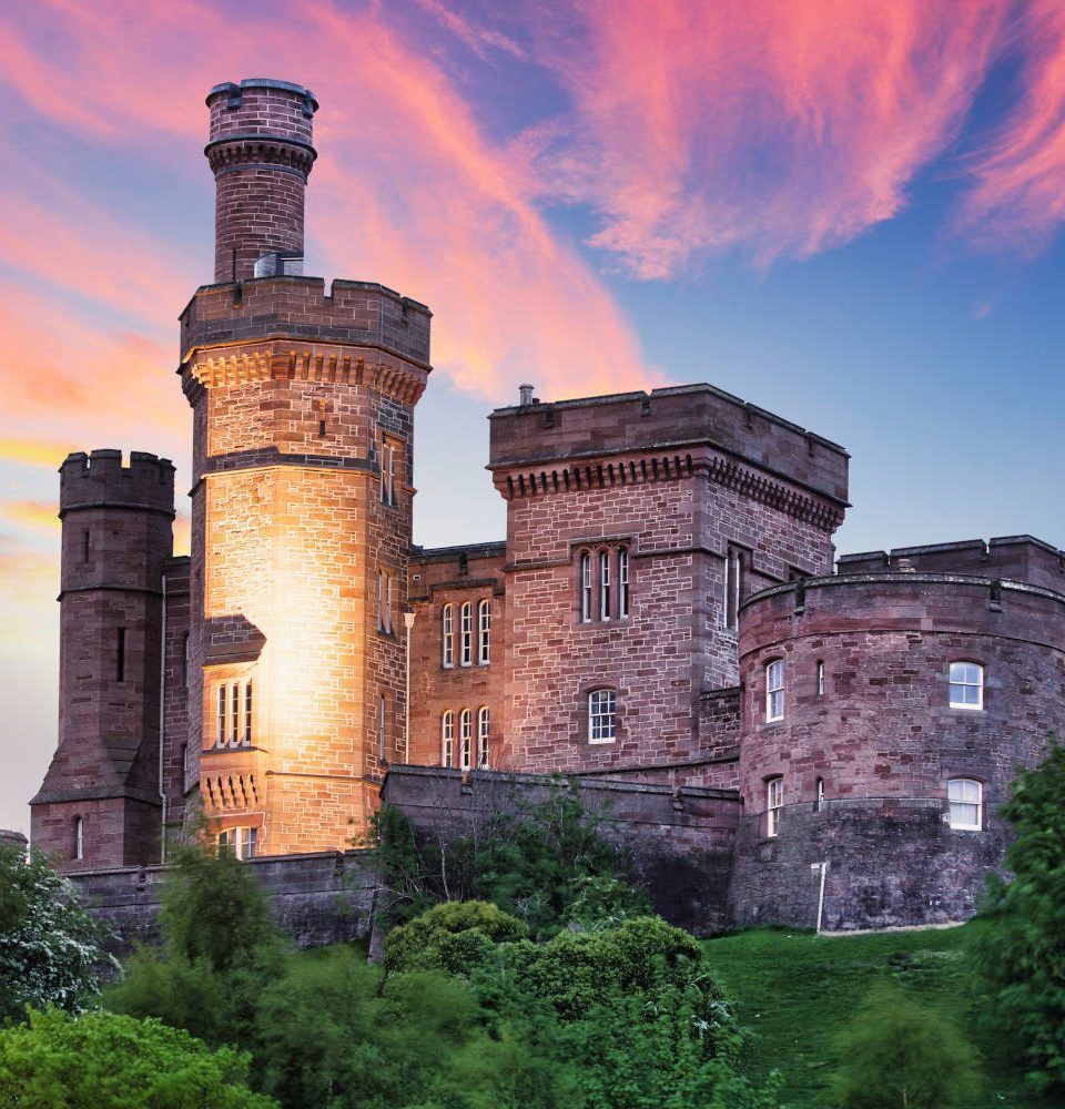 Inverness Castle with a blue sky and pink clouds
