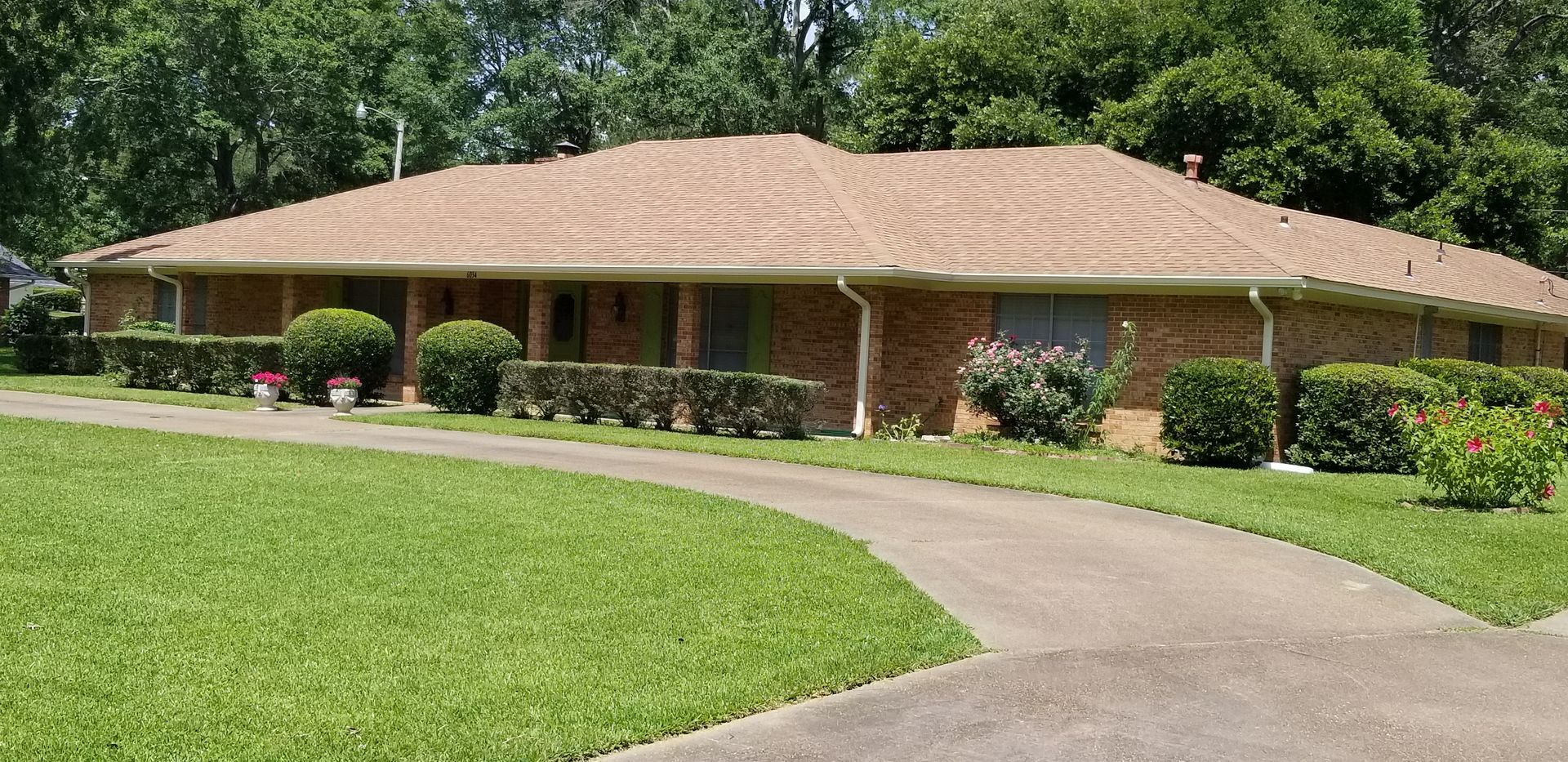 Big Brown House with Gutter and Downspouts — Jackson, MS — A&W Gutters