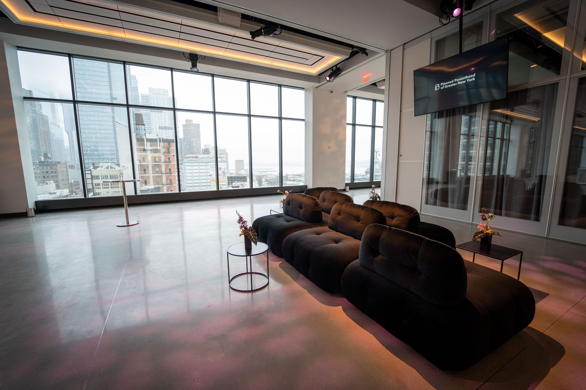 Planned Parenthood Event at The Glasshouse - photo of a large room with a lot of windows and a couch .
