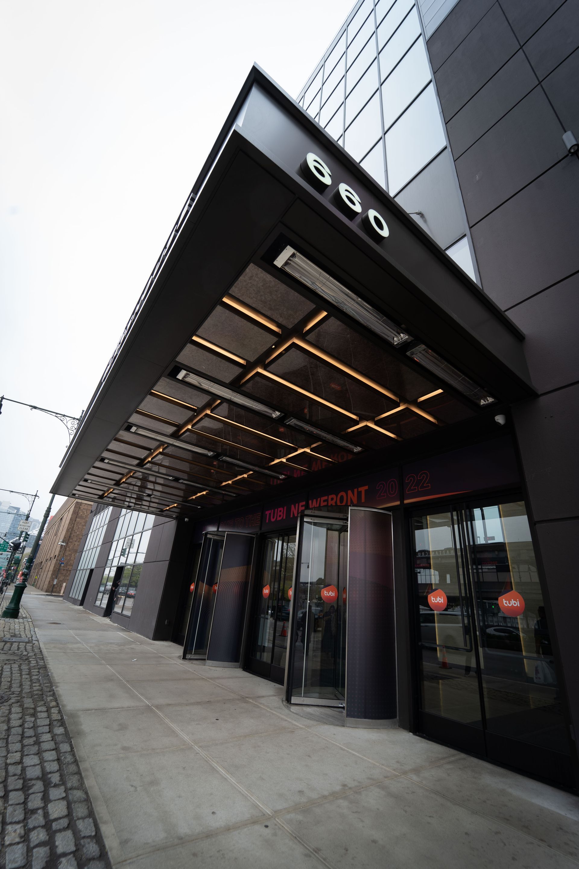 a large building with a canopy over the entrance