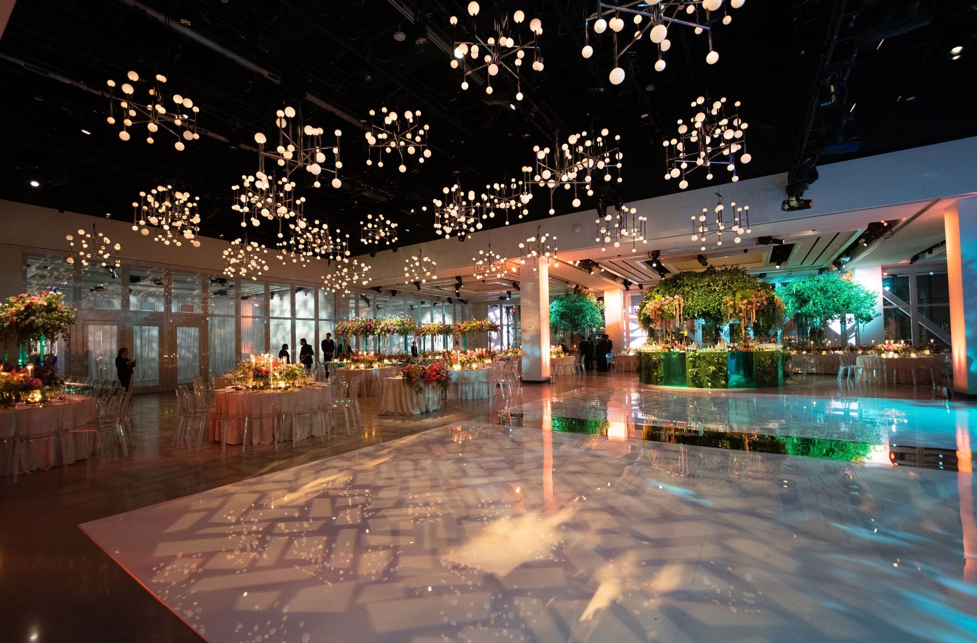 a large empty room with a lot of lights on the ceiling .