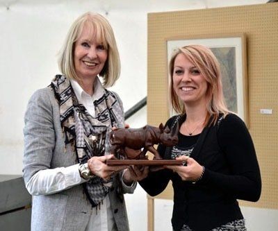 best african painting, Natalie Mascall wins best african painting and Pollyanna Pickering presents her the award, Natalie wins best african painting with her african dog pastel drawing drawn from her trip to Tanzania,
