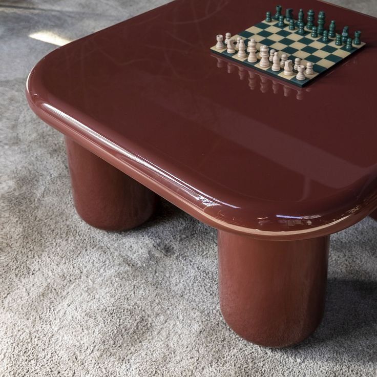 Round Maroon Coffee Table With A Chessboard On Top — Everyday Interiors in Helensburgh, NSW