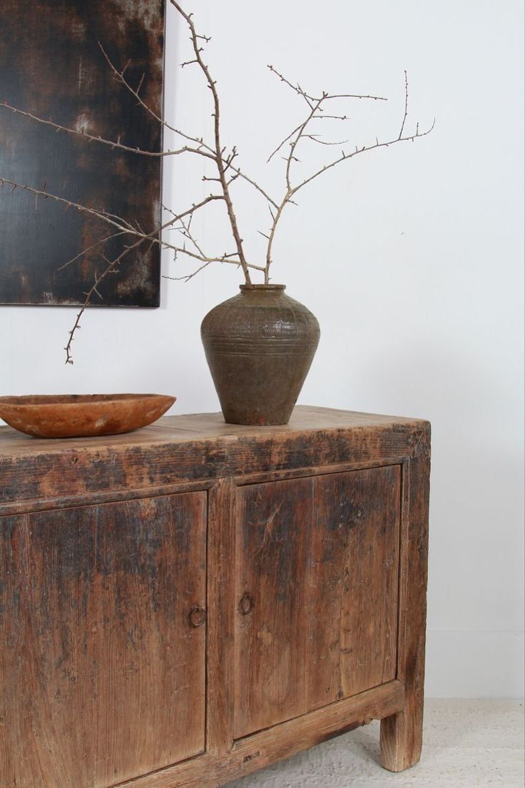 Rustic Wooden Cabinet With A Brown Vase Of Bare Branches — Everyday Interiors in Helensburgh, NSW