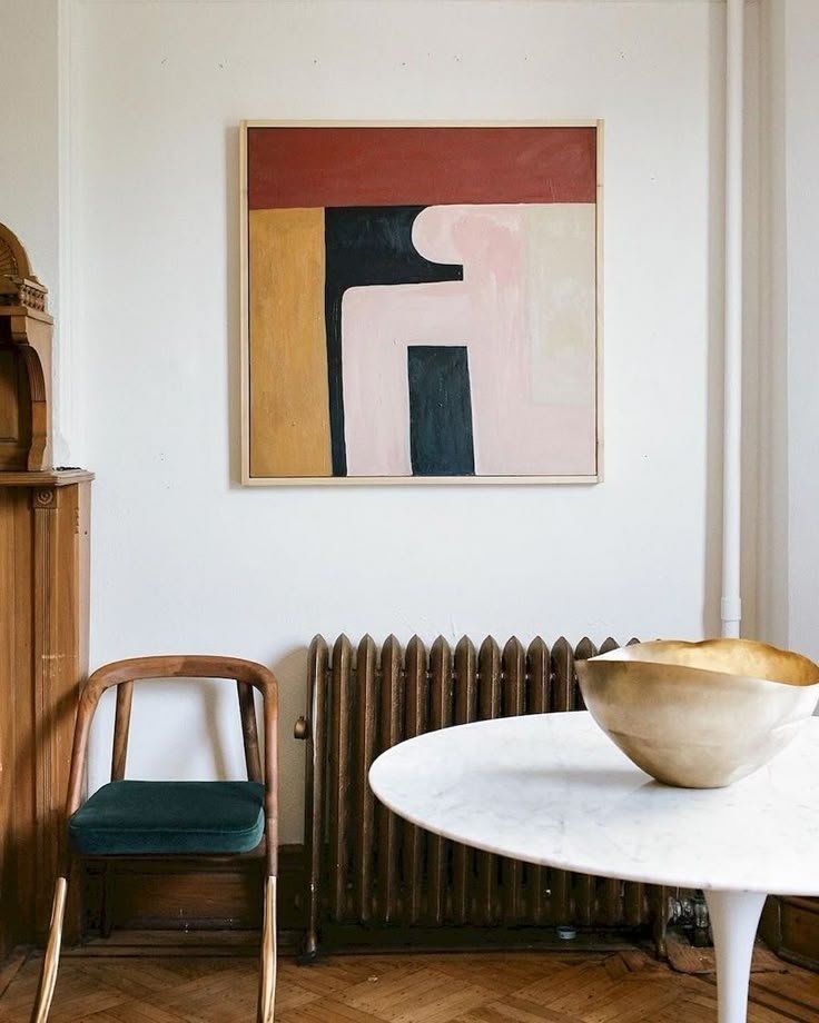 Minimalist Room With Abstract Wall Art And A Wooden Chair — Everyday Interiors in Helensburgh, NSW