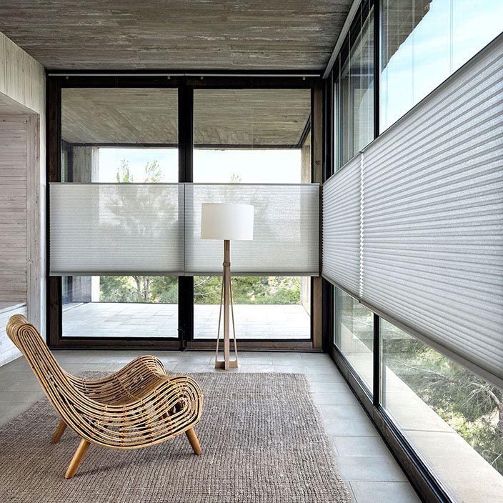 Modern Minimalist Sunroom With Wicker Lounge Chair — Everyday Interiors in Helensburgh, NSW