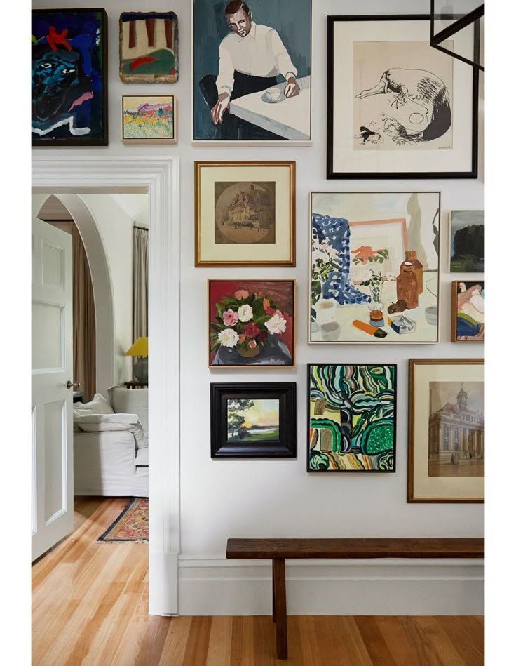 Framed Artwork Gallery Wall In A Bright Hallway With A Wooden Bench — Everyday Interiors in Helensburgh, NSW