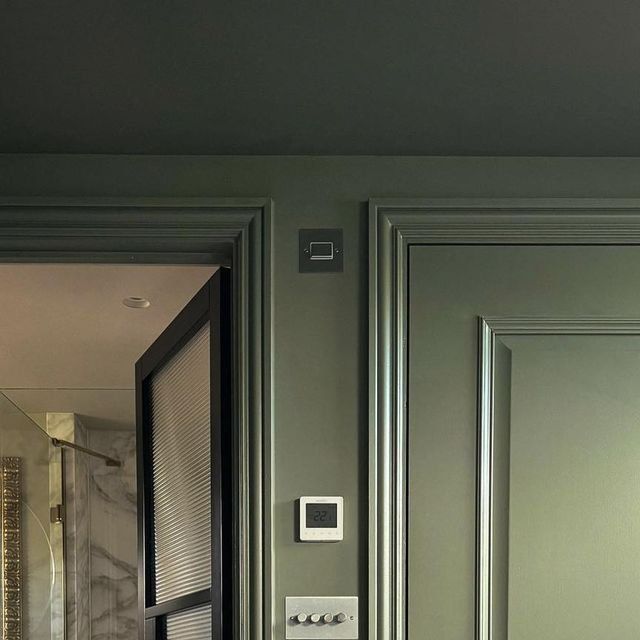 Two Gray Doors With Decorative Molding With One Partly Open — Everyday Interiors in Helensburgh, NSW