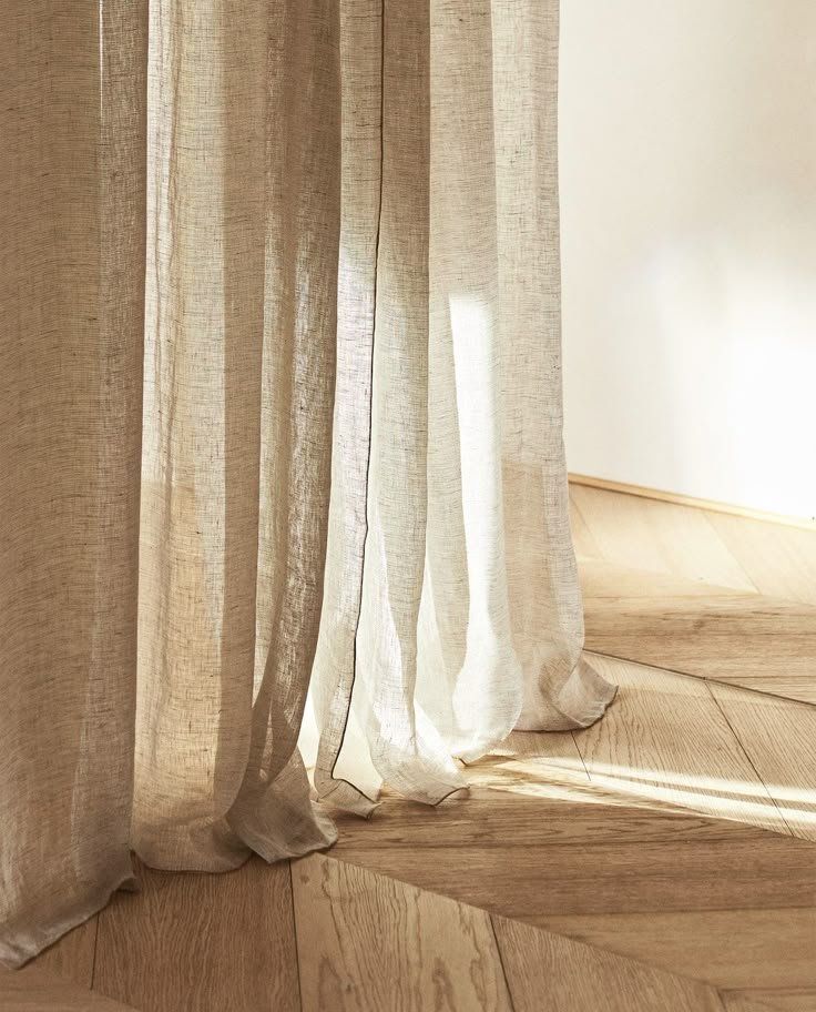 Sheer Beige Curtains By A Sunlit Window Over A Light Wood Floor — Everyday Interiors in Helensburgh, NSW