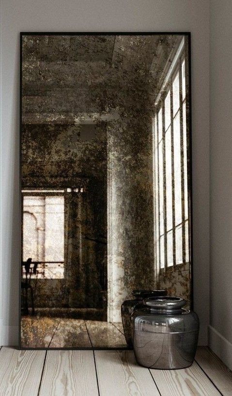 Tall Framed Mirror Leaning On A Floor Beside A Metal Bucket — Everyday Interiors in Helensburgh, NSW
