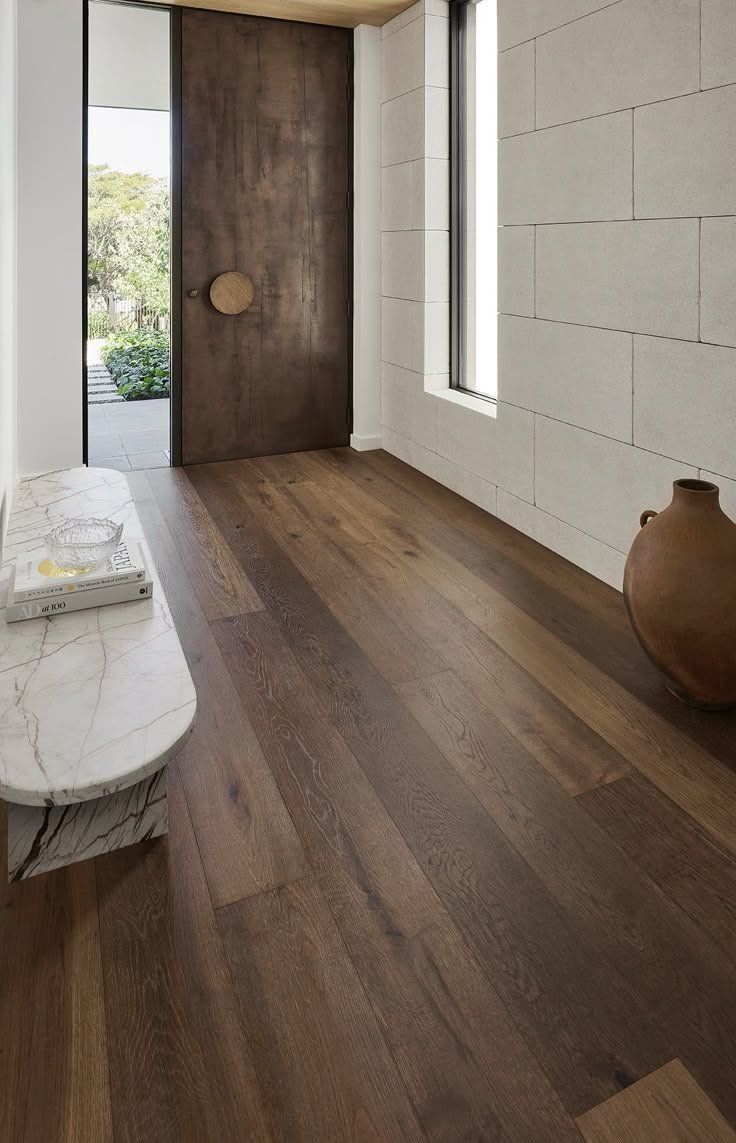 Modern Hallway With Dark Wood Floor And White Textured Walls — Everyday Interiors in Helensburgh, NSW