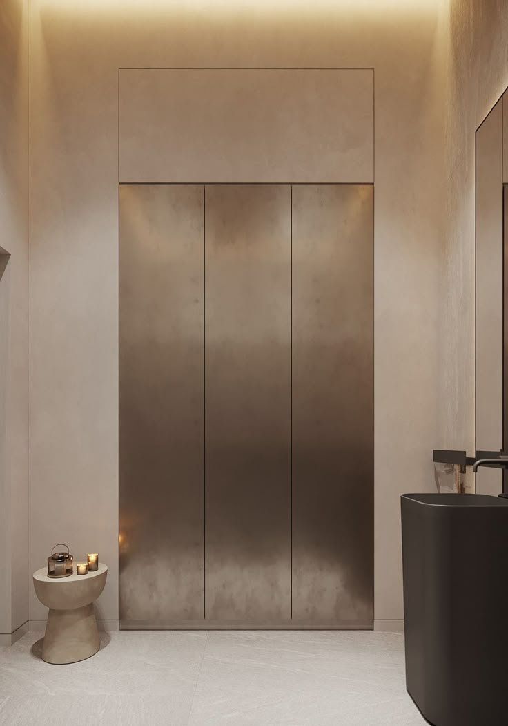 Minimalist Beige Hallway With Closed Metallic Elevator Doors — Everyday Interiors in Helensburgh, NSW