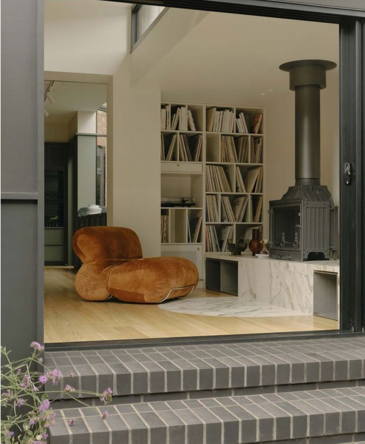 Modern Living Room With Orange Chaise And A White Shelving — Everyday Interiors in Helensburgh, NSW