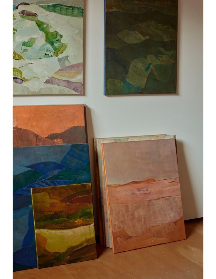 Four Abstract Paintings Leaning Against A Wall In A Room — Everyday Interiors in Helensburgh, NSW