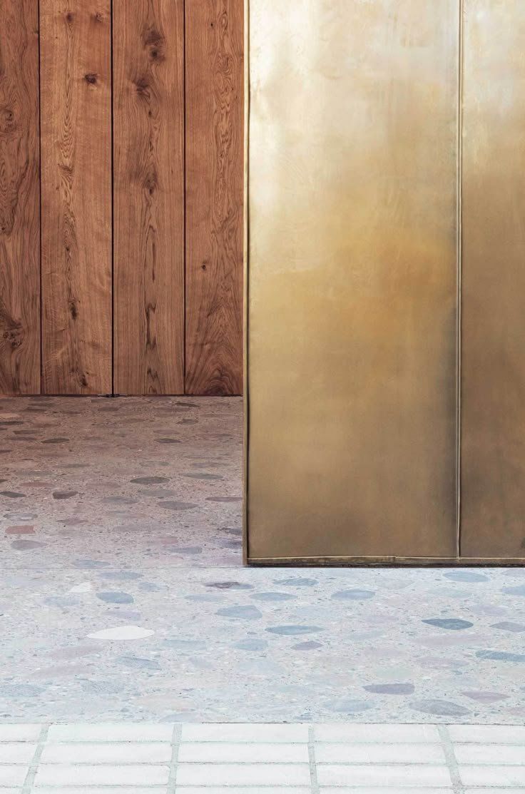 Wood-paneled Wall Beside A Brass Elevator Door — Everyday Interiors in Helensburgh, NSW