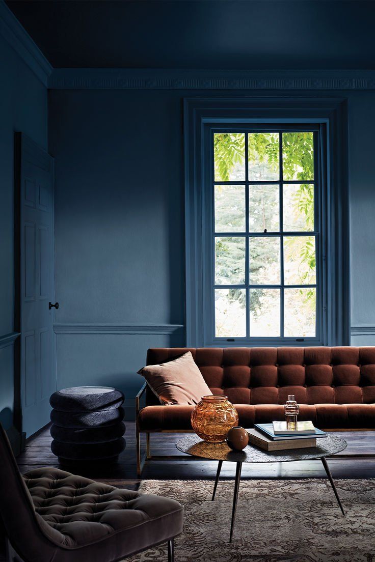 Dim Blue Living Room With A Brown Sofa, Tufted Chair And Coffee Table — Everyday Interiors in Helensburgh, NSW