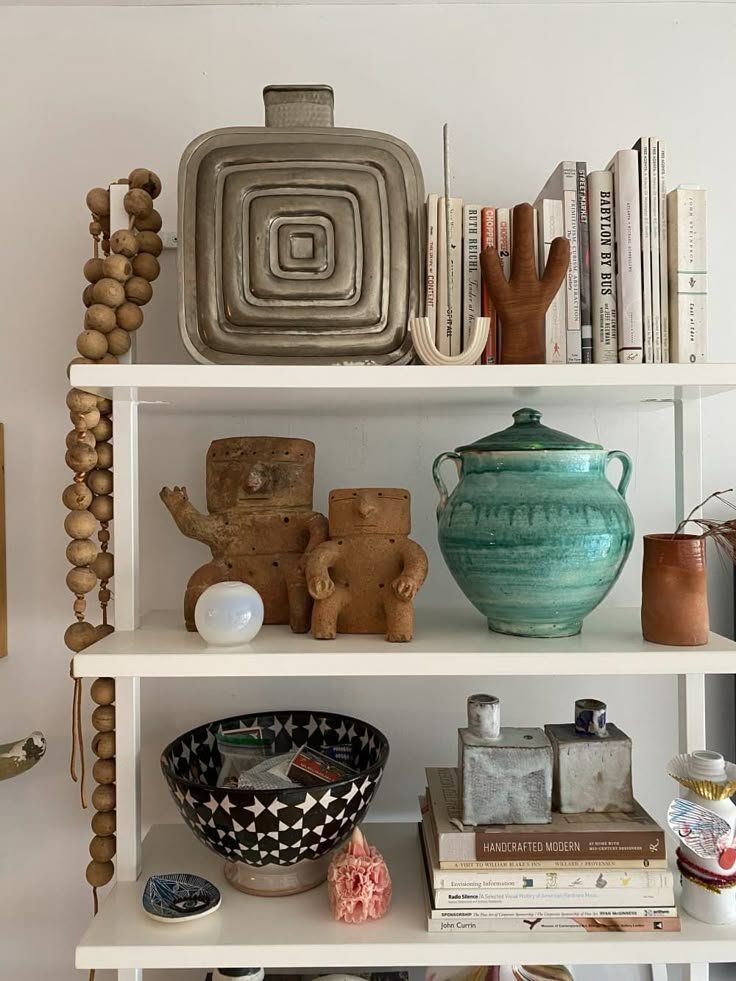 Decorative White Shelf With Books, Pottery And Woven Decor — Everyday Interiors in Helensburgh, NSW