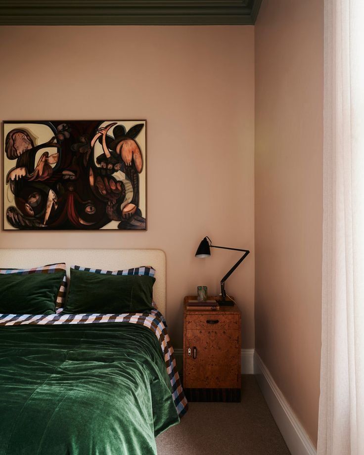 Cozy Bedroom With Green Bedspread And Framed Wall Art — Everyday Interiors in Helensburgh, NSW