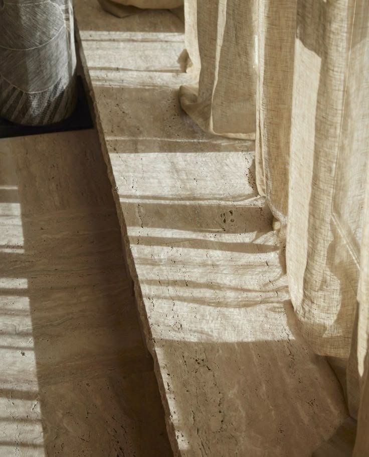 Sunlit Sheer Curtains Casting Striped Shadows On A Wooden Floor — Everyday Interiors in Helensburgh, NSW