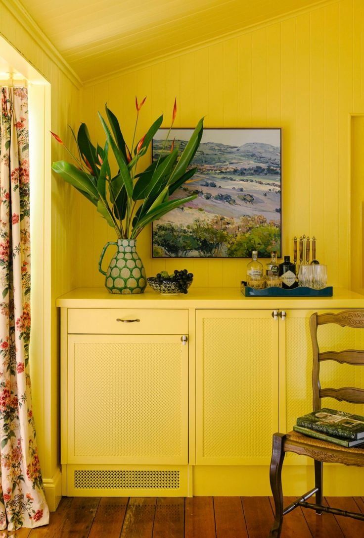 Yellow Room With Cabinet And Large Leaf Arrangement — Everyday Interiors in Helensburgh, NSW