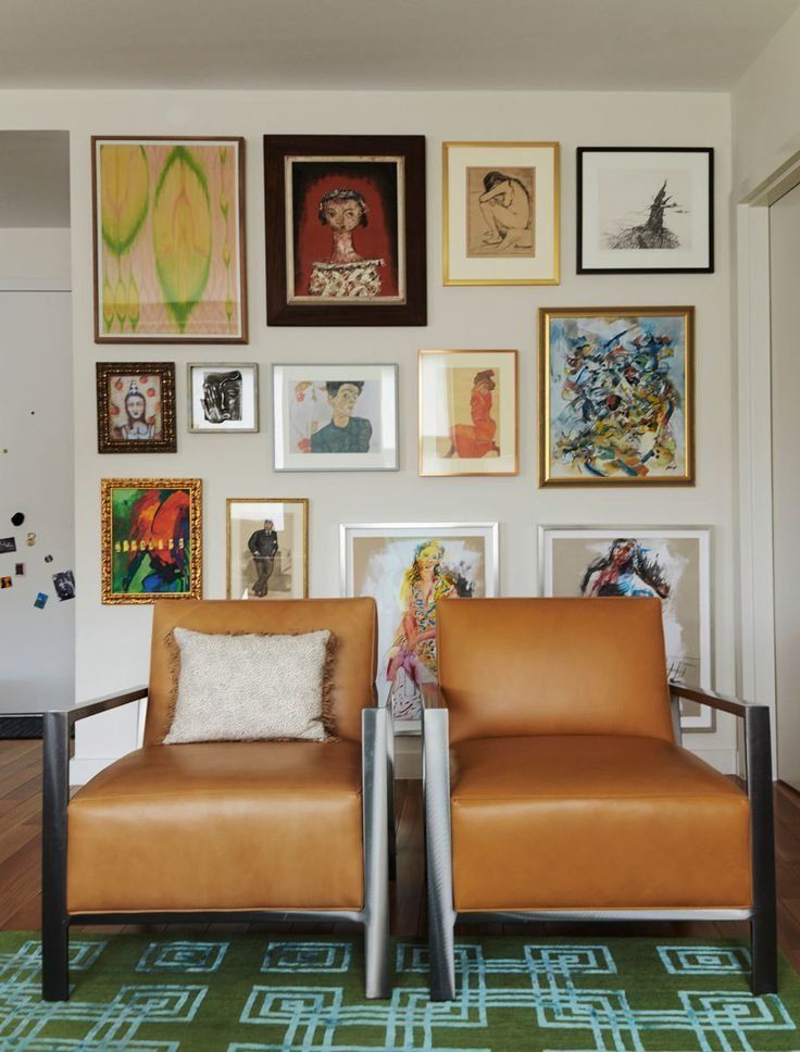 Two Tan Chairs Facing A Gallery Wall Of Colorful Framed Art — Everyday Interiors in Helensburgh, NSW