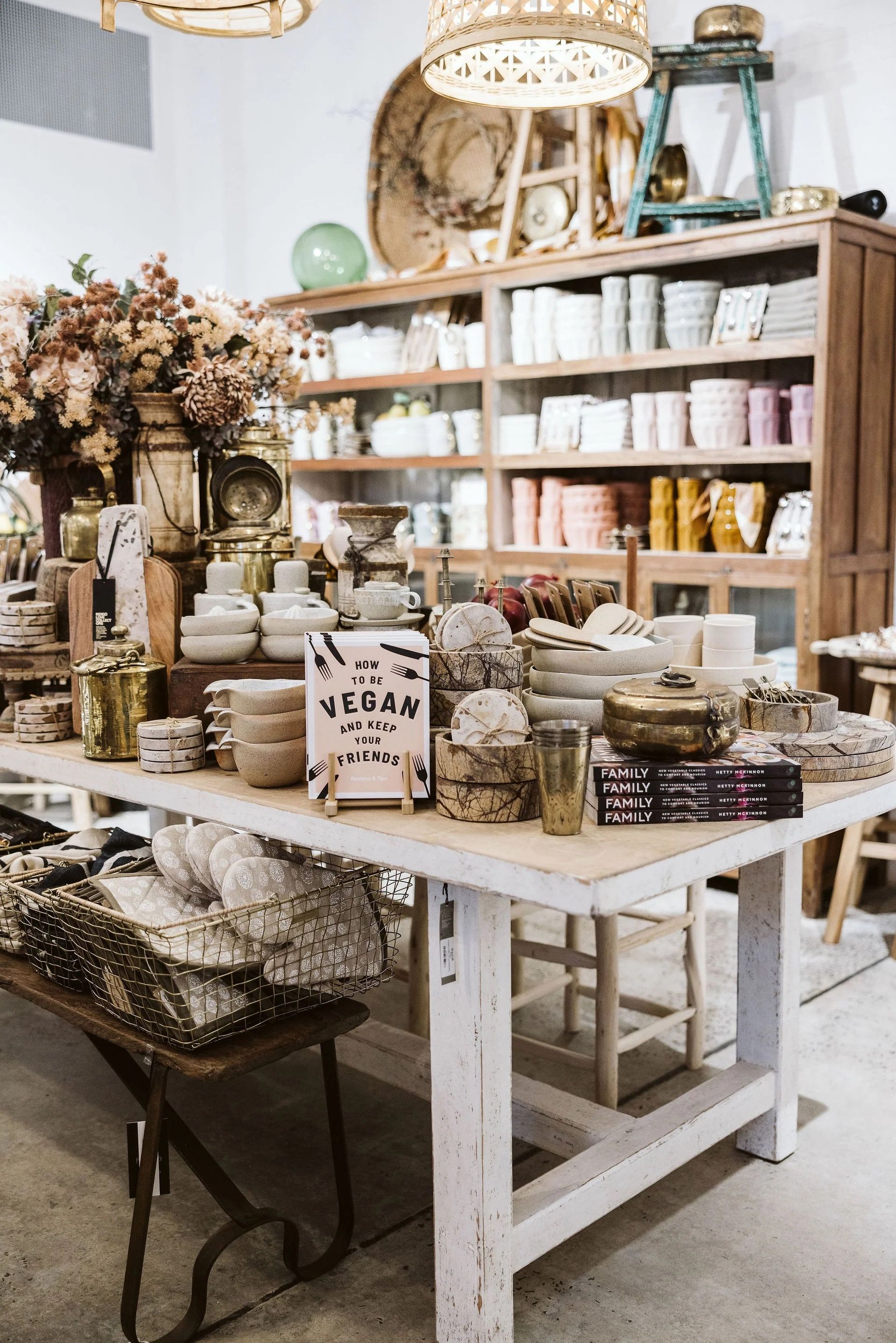 Rustic Gift Shop Display Table With Candles, Jars And Flowers — Everyday Interiors in Helensburgh, NSW