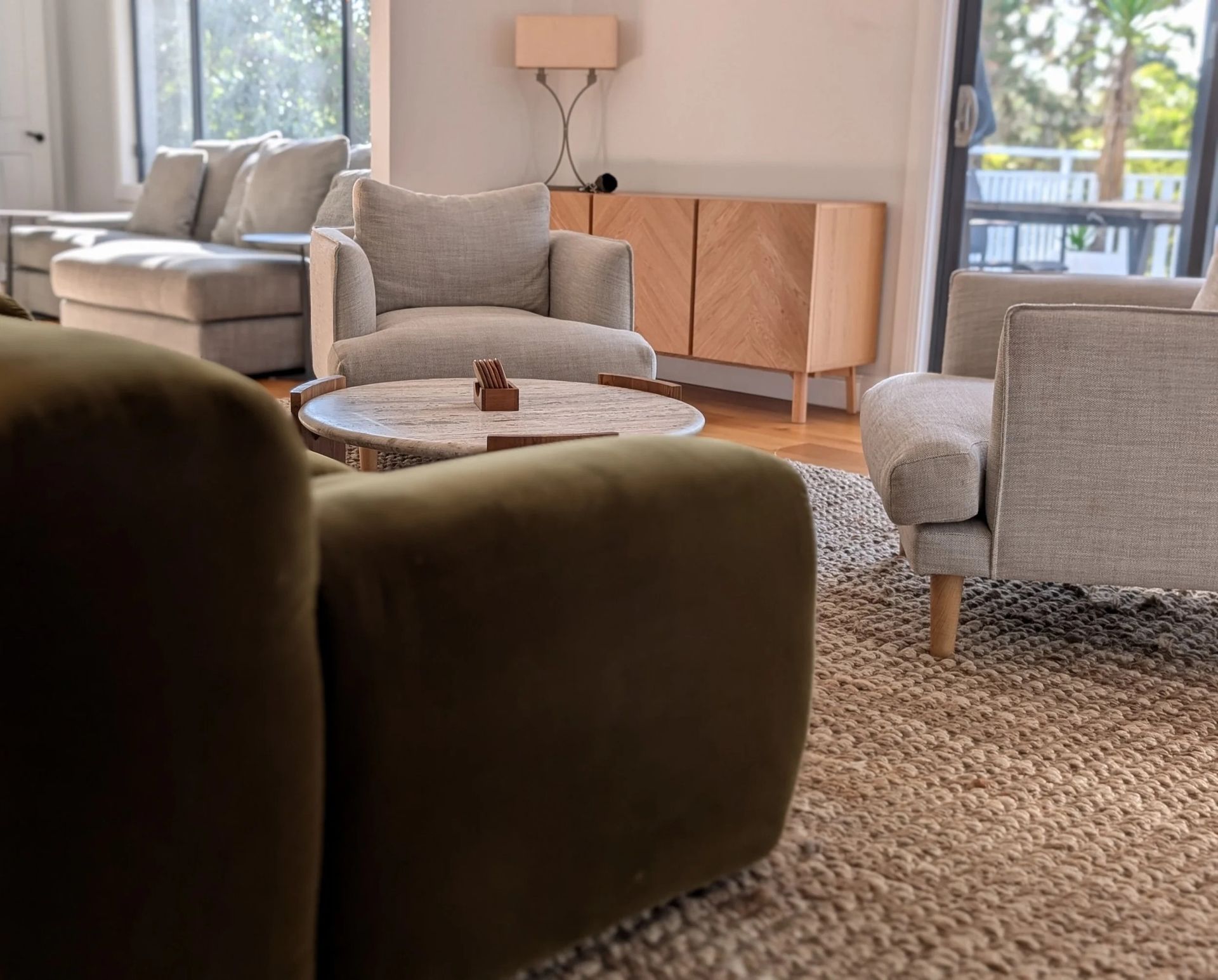 Modern Living Room With Gray Sofas And A Round Coffee Table — Everyday Interiors in Helensburgh, NSW