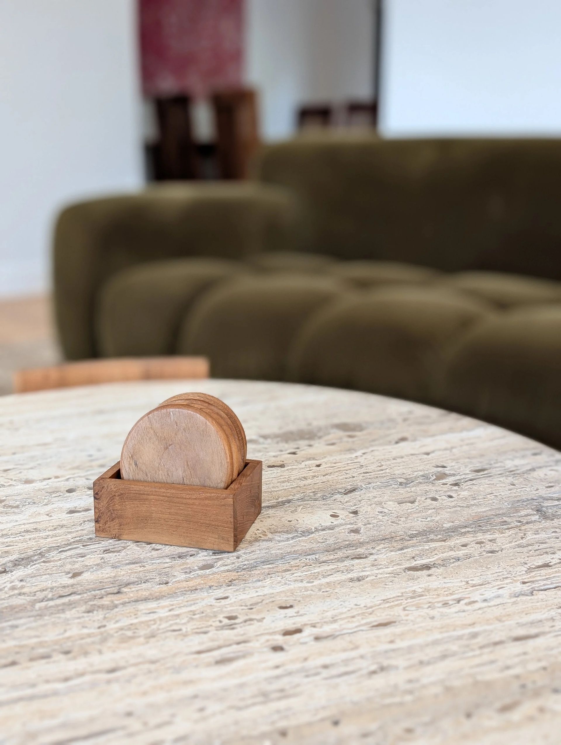 Small Wooden Coin Holder On A Textured Tabletop With A Sofa — Everyday Interiors in Helensburgh, NSW
