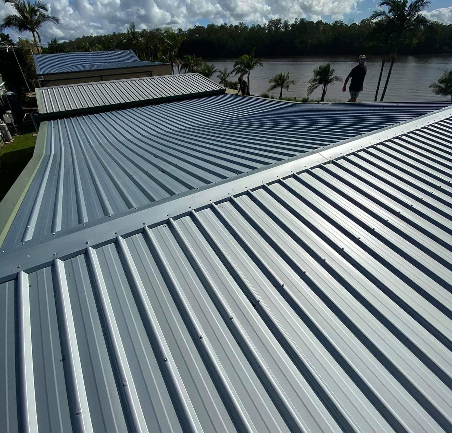 A High-Angle View Of A Shiny Metal Roof 