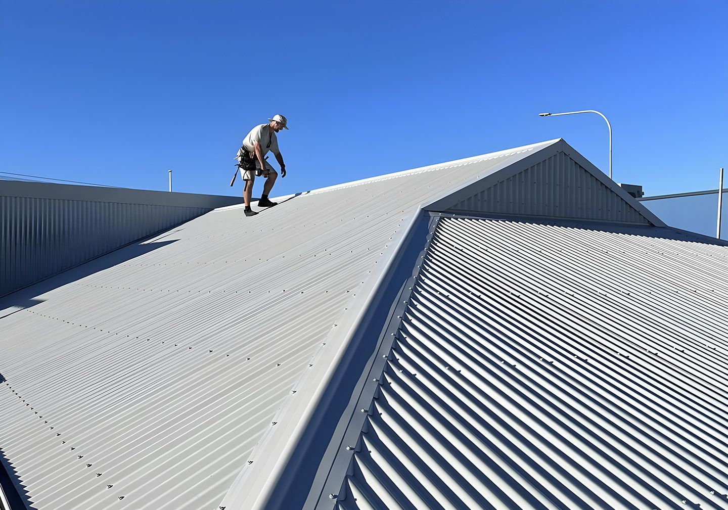 Expert Roofers In Ballina Inspecting A Metal Roof For Properties In Northern Rivers