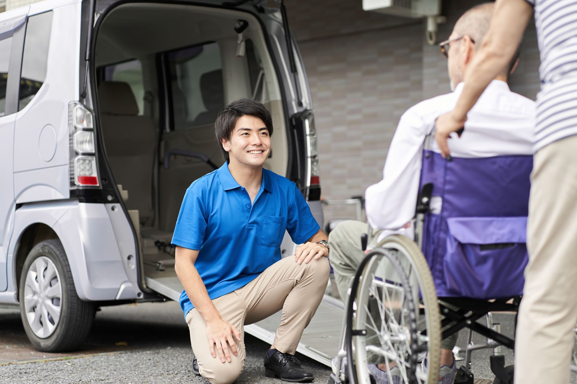 Assisting a Senior to Get Inside the Van