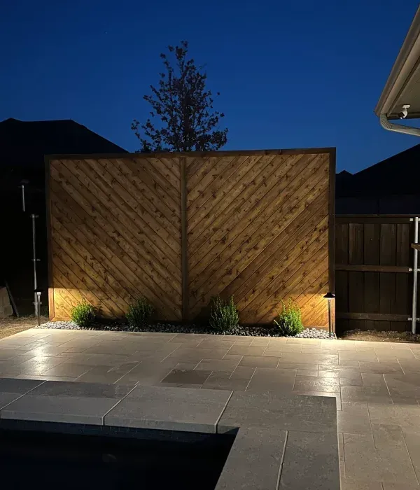 Low voltage landscape lighting service in Argyle TX illuminating walkways gardens and outdoor living spaces