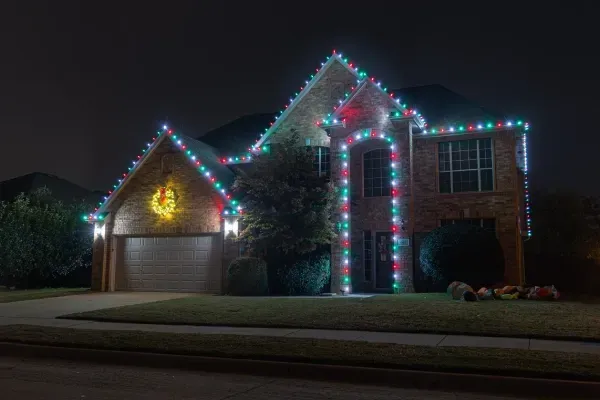 Holiday lighting and decoration installation in Argyle TX enhancing homes with professional seasonal displays