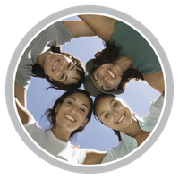 A group of women are standing in a circle and smiling