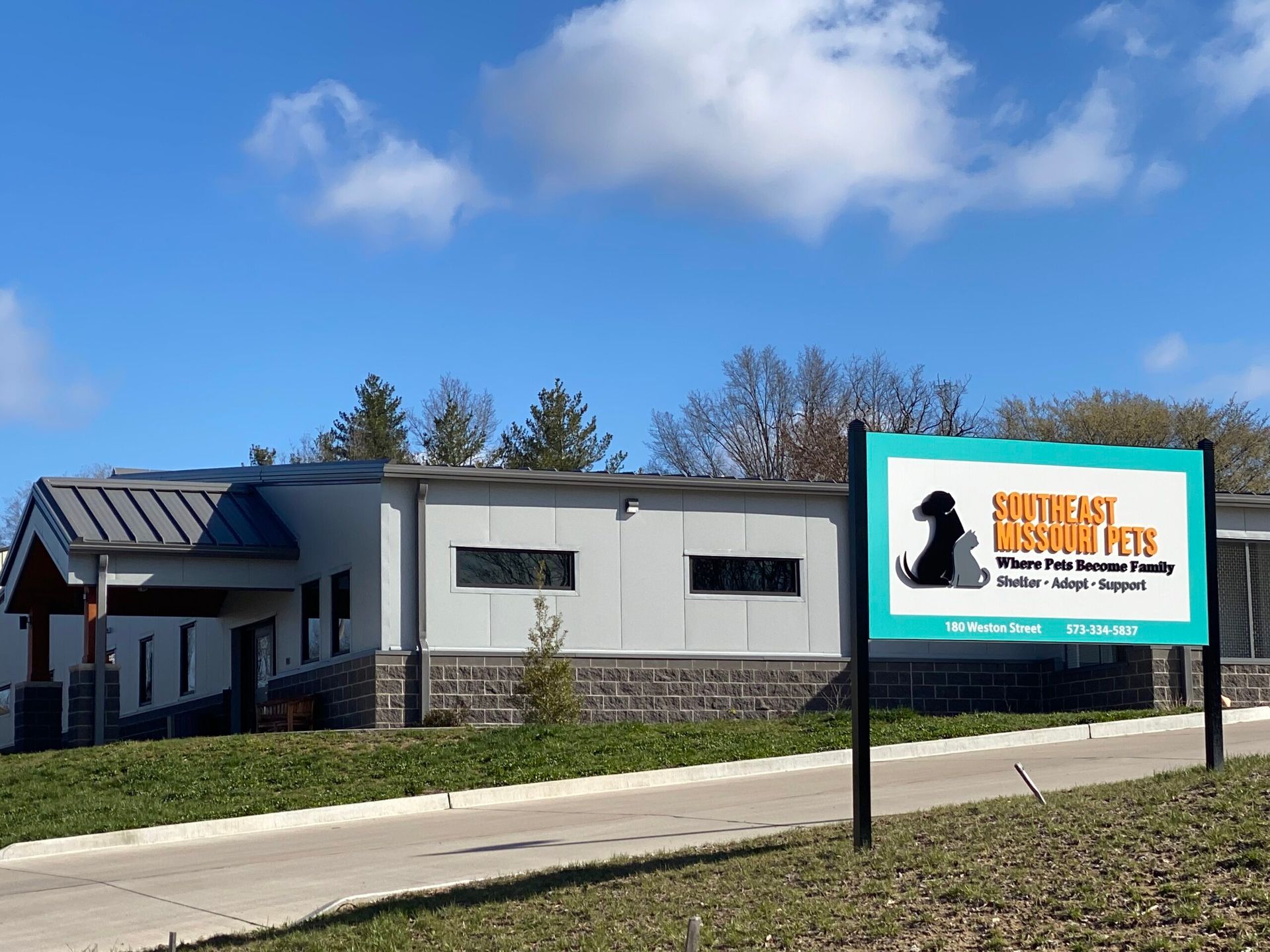 A building with a sign that says squirrel rescue