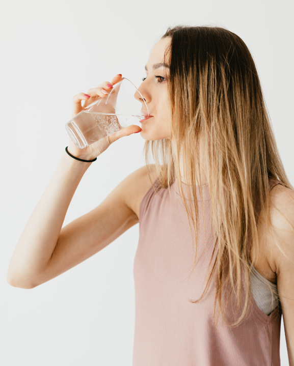 Young man drinking water