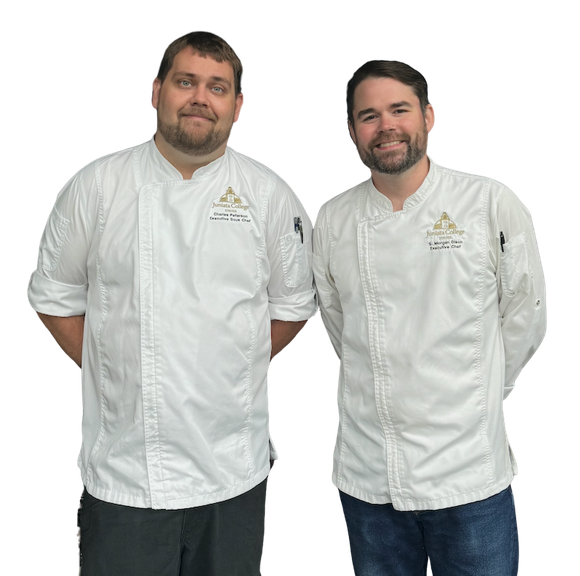 Two chefs in white uniforms stand side-by-side against a white background.