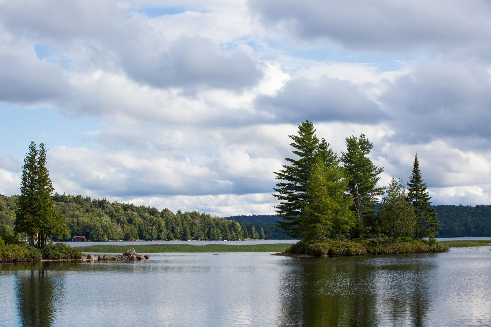a lake with a small island in the middle of it