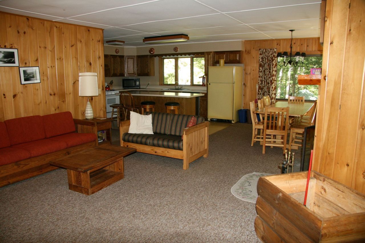a living room with a couch and a table in it