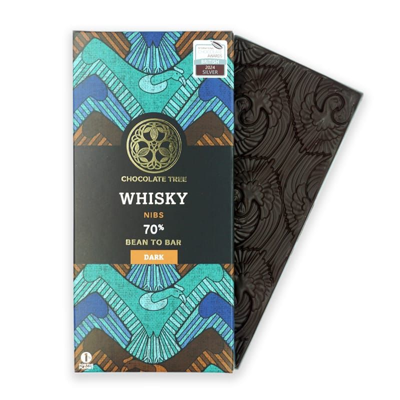 Laphroaig peated single malt whisky from the Scottish island of Islay, poured over rare heirloom cacao nibs from the Marañon canyon in Peru. After soaking we give the angels a good share, evaporating off the alcohol before blending the cacao nibs into dark Marañon chocolate.