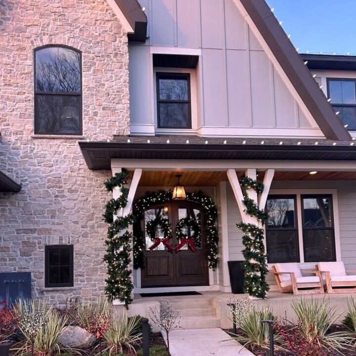 Custom Christmas lights outlining a Victoria, MN home with Wassermann Lake views