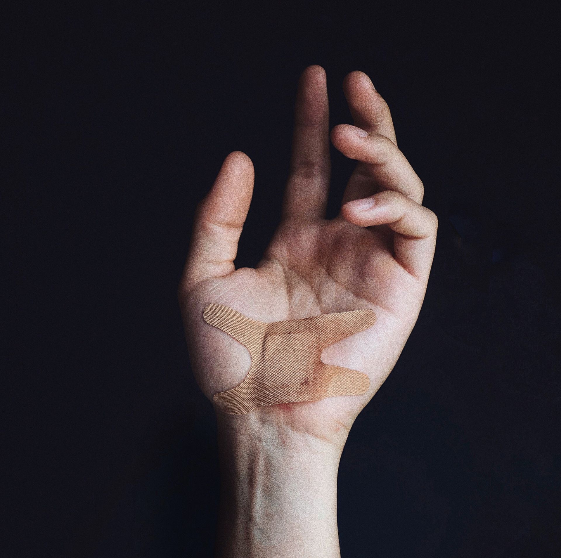 bandaged hand