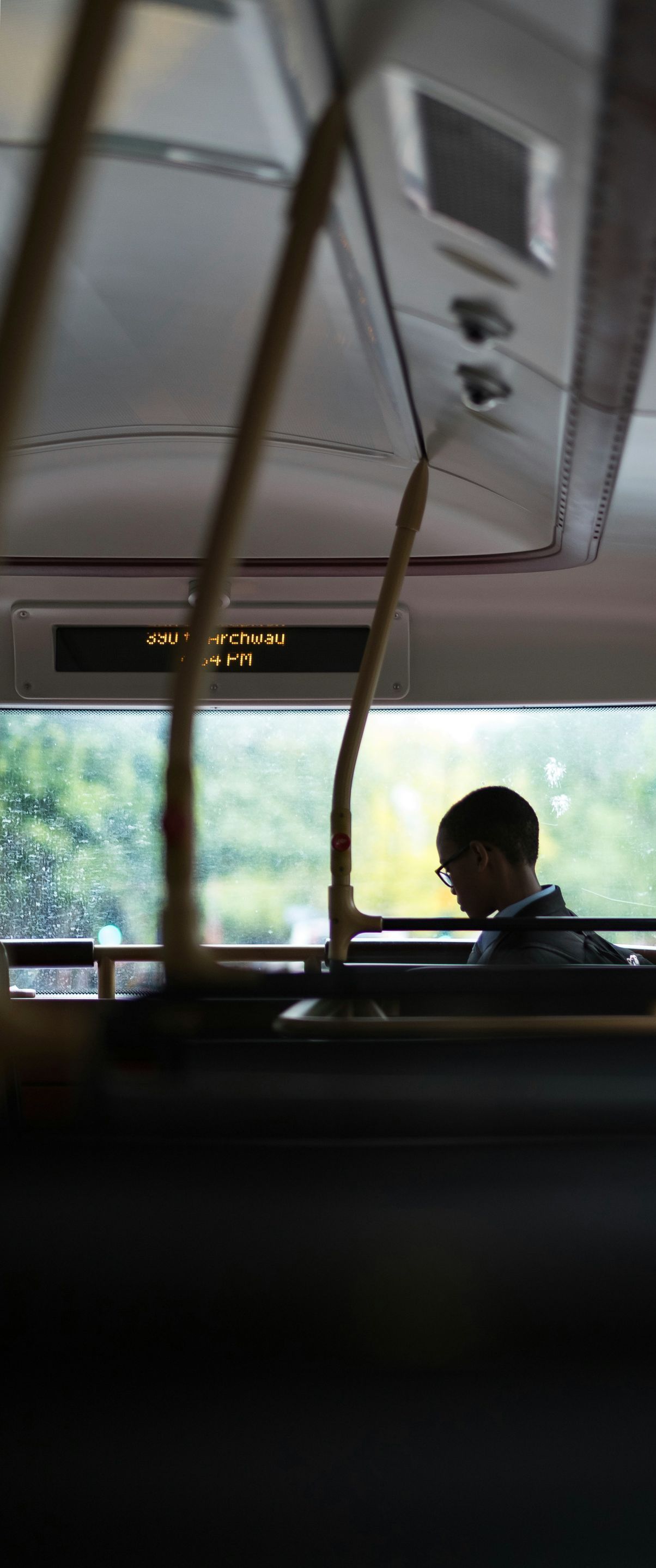person getting on a bus