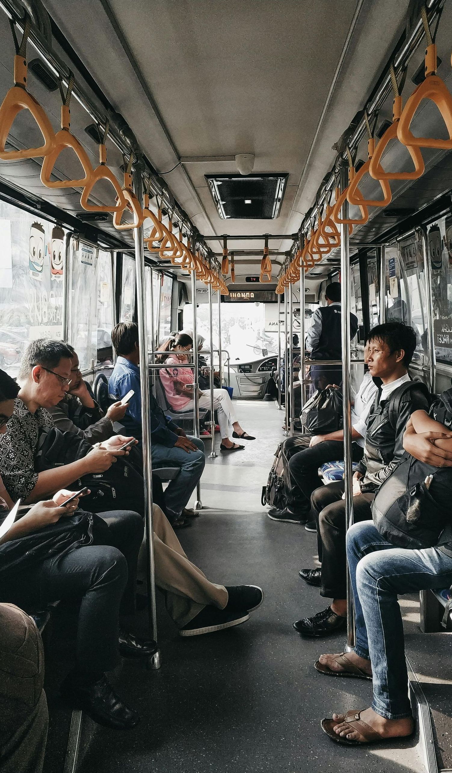 people riding on a bus