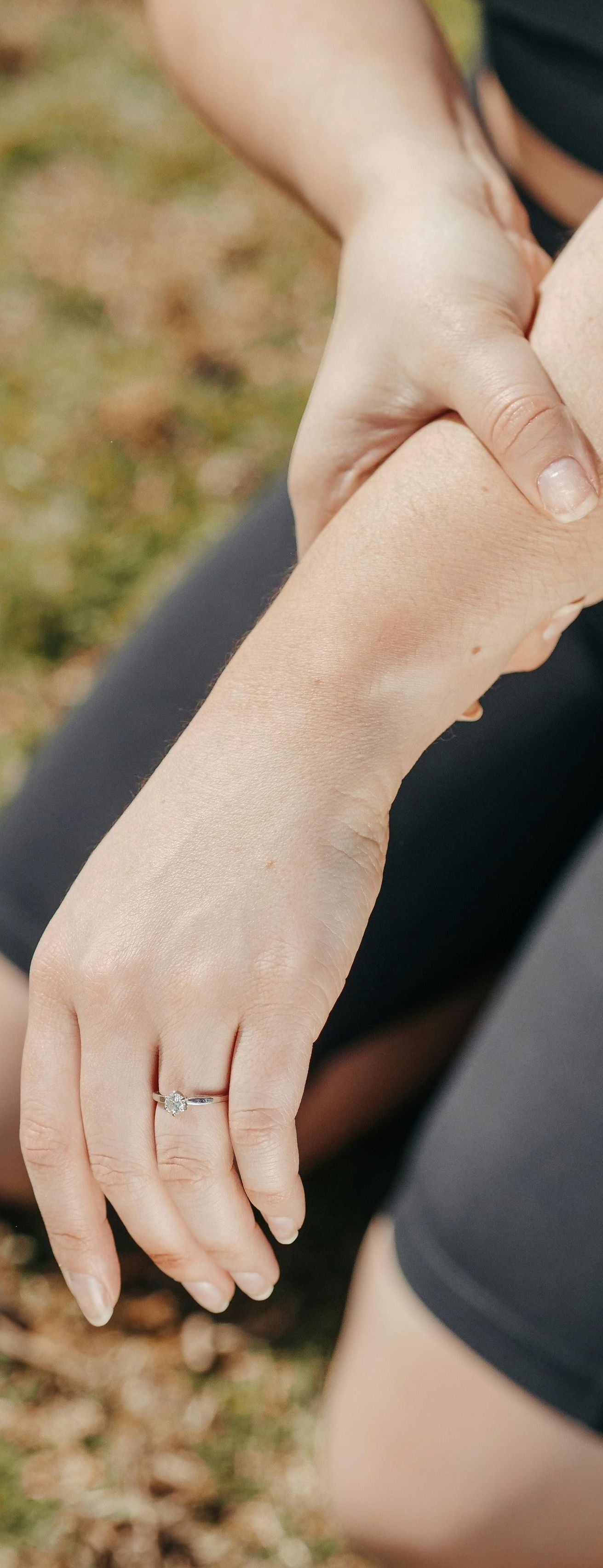 woman holding an injured arm